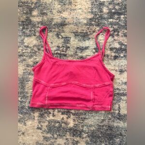 Urban Outfitters cropped out from under tank top